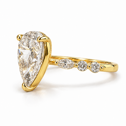 Pear-cut 2.01 carat engagement ring with all-yellow-gold setting — right three-quarter view