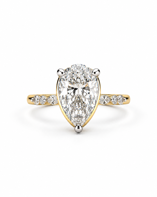 Pear cut engagement ring — neutral white studio photograph